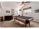 Game room with a pool table and wall-mounted TV at 1740 W Del Rio St, Chandler, AZ 85224