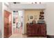 A galley kitchen with dark wood cabinets and granite countertops at 1740 W Del Rio St, Chandler, AZ 85224