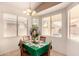 Cozy breakfast nook with a green tablecloth and plenty of natural light at 18109 W Skyline Dr, Surprise, AZ 85374