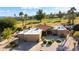 Stunning aerial view of a single-story home with a golf course view at 19035 E Tonto Trl, Rio Verde, AZ 85263