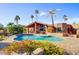 Inviting backyard oasis featuring a sparkling pool and relaxing patio area at 19035 E Tonto Trl, Rio Verde, AZ 85263