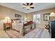 Comfortable bedroom with ceiling fan and window seating at 19035 E Tonto Trl, Rio Verde, AZ 85263