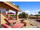 Relaxing patio with lounge chairs and seating area at 19035 E Tonto Trl, Rio Verde, AZ 85263