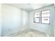 Bright bedroom with new flooring and large windows at 22859 E Lords Way, Queen Creek, AZ 85142