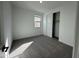 Bright bedroom featuring carpet and a sizable closet at 22859 E Lords Way, Queen Creek, AZ 85142