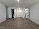 A bright flex room featuring tile flooring and fresh white walls at 22859 E Lords Way, Queen Creek, AZ 85142