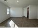 Bedroom with tile flooring and access to bathroom at 22859 E Lords Way, Queen Creek, AZ 85142