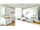 Modern kitchen with white cabinets and ample counter space at 22859 E Lords Way, Queen Creek, AZ 85142