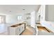 Modern kitchen with white cabinets and island at 22859 E Lords Way, Queen Creek, AZ 85142