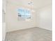 Bright dining room with tile floors and large window at 24 S 175Th Ave, Goodyear, AZ 85338