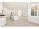 Bright, open kitchen and dining area with modern lighting at 24 S 175Th Ave, Goodyear, AZ 85338