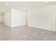 Spacious living room with tile floors and neutral color palette at 24 S 175Th Ave, Goodyear, AZ 85338