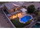 Night aerial view of house and pool at 2602 W Trapanotto Rd, Phoenix, AZ 85086