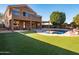 Backyard with pool, grass, and patio at 2602 W Trapanotto Rd, Phoenix, AZ 85086