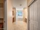 Bathroom with a large bathtub, tile flooring and window at 2602 W Trapanotto Rd, Phoenix, AZ 85086