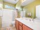 Bathroom with double sinks, bathtub, and shower at 2602 W Trapanotto Rd, Phoenix, AZ 85086