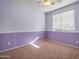 Light purple bedroom with carpet flooring and window blinds at 2602 W Trapanotto Rd, Phoenix, AZ 85086