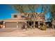 Two-story house with a two-car garage and mature trees at 2602 W Trapanotto Rd, Phoenix, AZ 85086