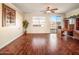 Home office with wood flooring, desk, and built-in shelves at 2602 W Trapanotto Rd, Phoenix, AZ 85086