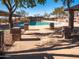 Community pool with lounge chairs and shade at 2602 W Trapanotto Rd, Phoenix, AZ 85086