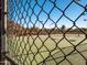 Outdoor tennis court with chain-link fence at 2602 W Trapanotto Rd, Phoenix, AZ 85086