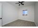 Bright bedroom with tile flooring and a window with a view at 29456 N 208Th Ln, Wittmann, AZ 85361