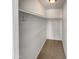 Large walk-in closet with double hanging rods at 31027 W Bellview St, Buckeye, AZ 85396