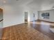 Open living area with tile and wood flooring at 31027 W Bellview St, Buckeye, AZ 85396