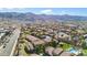 Aerial view of community, pool, and mountain backdrop at 3511 E Baseline Rd # 1243, Phoenix, AZ 85042