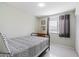 Well-lit bedroom with a double bed at 3511 E Baseline Rd # 1243, Phoenix, AZ 85042