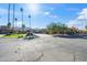 Community entrance with landscaping and mountain views at 3511 E Baseline Rd # 1243, Phoenix, AZ 85042