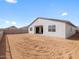 Backyard with partial block wall and potential for customization at 35581 N Thicket Way, San Tan Valley, AZ 85144