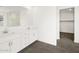 Bright bathroom featuring double vanity and framed mirror at 35581 N Thicket Way, San Tan Valley, AZ 85144