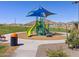 Community playground featuring slides, a climbing area, and a picnic spot for families to enjoy outdoor activities at 35581 N Thicket Way, San Tan Valley, AZ 85144