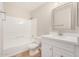 Bathroom with white vanity, tub and tile flooring at 3830 E Lakewood Pkwy # 1114, Phoenix, AZ 85048