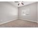 Spacious bedroom with neutral walls and carpeting at 3830 E Lakewood Pkwy # 1114, Phoenix, AZ 85048