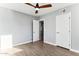 Bright bedroom with wood-look floors and ceiling fan at 3850 N 12Th Ave, Phoenix, AZ 85013