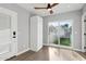 Laundry room with sliding door access to backyard and white cabinets at 3850 N 12Th Ave, Phoenix, AZ 85013