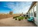 Relax on the patio furniture and enjoy the desert landscape at 39725 N Hailey Ln, San Tan Valley, AZ 85140