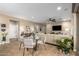 Bright dining area with glass table near living room at 39725 N Hailey Ln, San Tan Valley, AZ 85140