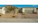 Single story home with stone accents and a welcoming front porch at 39725 N Hailey Ln, San Tan Valley, AZ 85140