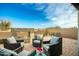 Relaxing patio with fire pit and seating at 39725 N Hailey Ln, San Tan Valley, AZ 85140