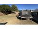 Large backyard with trampoline and chicken coop at 416 N Orange --, Mesa, AZ 85201