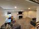 Finished basement with fireplace and built-in shelving at 416 N Orange --, Mesa, AZ 85201