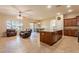 Kitchen with island, granite countertops, and stainless steel appliances at 44562 W Sedona Trl, Maricopa, AZ 85139