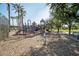 Another view of the community playground with play equipment at 44562 W Sedona Trl, Maricopa, AZ 85139