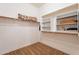 Large walk-in closet with shelves and hanging rods at 44562 W Sedona Trl, Maricopa, AZ 85139