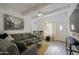 Bright living room featuring a comfy sofa, stylish coffee table, and large TV at 4754 N 14Th St, Phoenix, AZ 85014