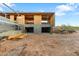 Unfinished garage with concrete foundation and wood framing at 4975 E Mcdonald Dr, Paradise Valley, AZ 85253