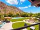 Luxury property with a large backyard, pool, sports court, and mountain views at 5040 N Arcadia Dr, Phoenix, AZ 85018